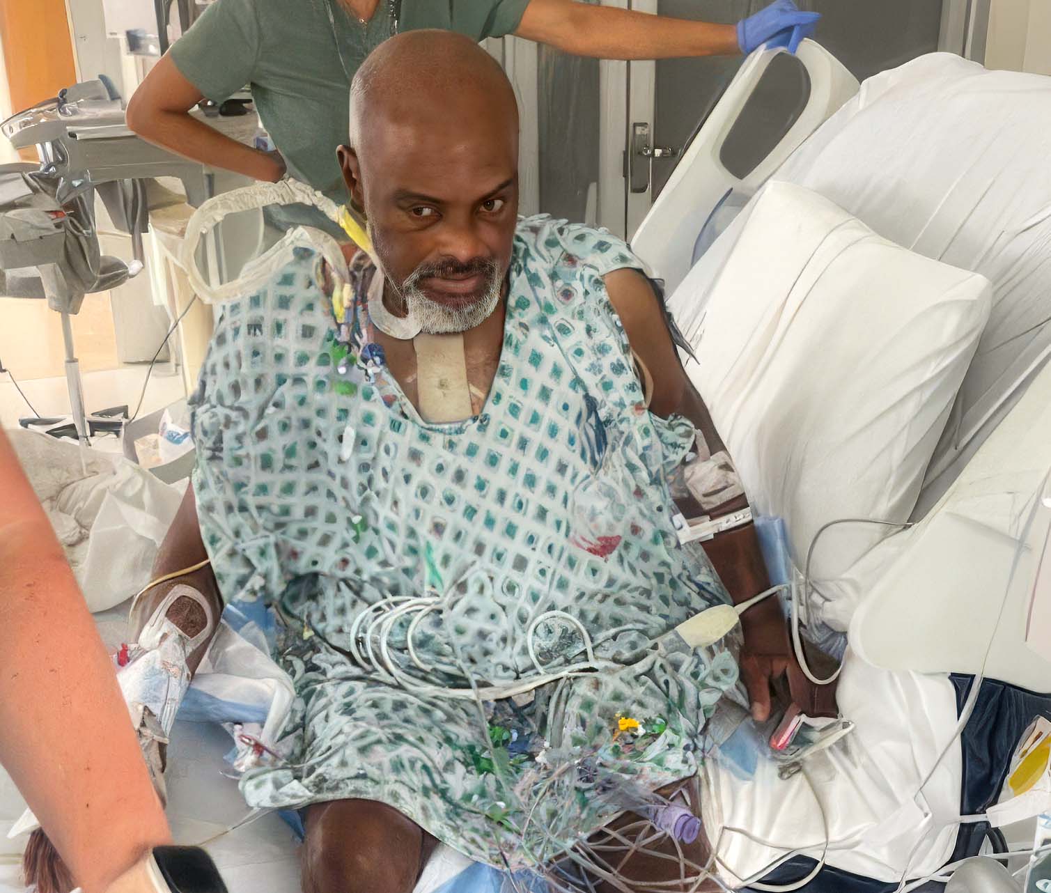 Marlin in hospital bed with medical staff.